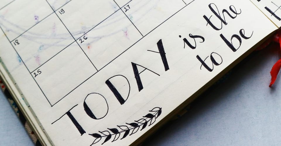 text reads TODAY is the to be. Photo by Bich Tran: https://www.pexels.com/photo/writings-in-a-planner-636246/ 